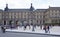 Place Carrousel, Louvre. Tourists walk and take pictures. Trans