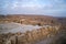 Place of excavation in Masada complex. An ancient Jewish fortress on top of a rock. Archaeological activity in Israel. desert,