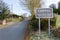 Place name sign at the village of Carmel