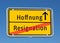 Place sign hope / resignation in german