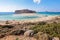 Place for tourists rest Balos lagoon, shore of Crete island, Greece. Ionian, Aegean and Libyan seas. Scenery of sunny summer day.