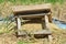 Place And Traditional Wooden Tool For Pounding Rice Grains In The Rice Field During Harvest