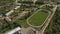 A place where people exercise. A stadium where people run, filmed from a height.