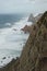 Place where the sea meets the land. High cliffs. Big waves and gusty winds. Cabo da Roca - rainy day.