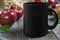 Placeit-Black coffee mug mockup with red apples