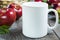 Placeit-Coffee mug mockup with red apples