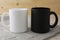Placeit-White and black coffee mug mockup on a napkin