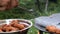 Placing the fried squid in a pot