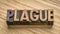Plague word in wood type