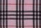 Plaid material, pink with black. Bengaline, cotton texture background