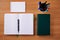 Plain Blank Open Notebooks With Stack Of Pens Inside Container Placed On Top Of A Table. Simple Empty Lined Notepads