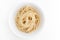 Plain cooked spaghetti pasta in white bowl, on white background.