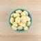 Plain potato gnocchi in a green bowl