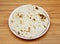 plain tandoori roti or sada roti, nun, tandoori, chapati, pita, bread served in a dish isolated on wooden table side view of