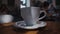 Plain white coffee cup on table in the cafeteria, defocus people at background
