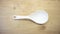 plain white plastic rice spoon