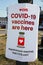 PLAINSBORO, NJ -6 MAR 2021- View of a sign for free COVID-19 vaccines at a CVS pharmacy in New Jersey, USA.