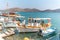 Plaka, Crete - October 16, 2019: Fishing boats near the pier on Crete island, Greece