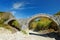 Plakidas arched stone bridge of Zagori region in Northern Greece. Iconic bridges were mostly built during the 18th and 19th