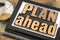 Plan ahead phrase in wood type