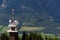 Planai telecommunication tower with flying paragliders in background