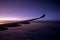 Plane, aeroplane wing, clouds,  gradient sky from aerial view