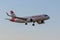 Plane Airbus A320 Neo Austrian Airlines Donau Auen approaching early morning at London Heathrow Airport