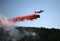 Plane Drops Fire Retardant