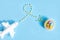 plane flies on blue background.yellow sweets. Direction sign for easter eggs. Spring and Easter are coming.Beautiful creative