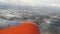 The plane flies under the clouds over the snowy fields of Ukraine - view from the window 16