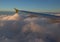 Plane flying above clouds, view from airplane porthole