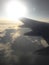 Plane flying clouds sunrise atmosphere