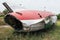 Plane fuselage wreckage sitting on the ground