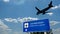 Plane landing in Edinburgh Scotland airport with signboard