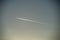 plane leaving smoke trail in the sky