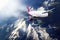 Plane mauve pink sky cloud travel transportion airplane mountains