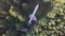 Plane in the middle of a forest in Oregon near Portland. Aerial view of Airplane home in the woods in Oregon, West coast, USA