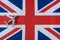 The plane over the flag of great Britain, the concept of travel.