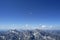 Plane over Watzmann Hocheck mountain, Bavaria, Germany