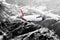 Plane red black white travel transportion airplane mountains