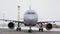 Plane rides on runway. Stock footage. Plane is preparing for takeoff moving along runway in winter. Plane on runway