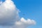 Plane in the sky. Cloudscape and airplane. Aviation and transport background. Flight and travel concept.