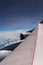 Plane wing and Clouds in airplane window