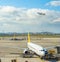 Planes, buses at airport runway