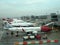 Planes lined up at air bridges