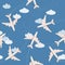 Planes with trajectories and stars on the blue sky seamless vector background