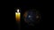 Planet earth illuminated by candle. Concept of global warming or earth hour. Soft focus