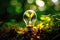 Planet saving symbol: plant sprout in light bulb of renewables
