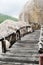 Plank bridge and huge stones boulders, Koh Nanguan, Thailand