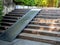 Plank wood stair outdoor with wooden wheelchair ramp